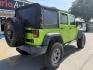 2013 Commando Green /Black Cloth Interior Black Leather Interior Black/ Jeep Wrangler 45733 (1C4BJWFG9DL) with an 3.6L V6 DOHC 24V FFV engine, 5-Speed Automatic6-Speed Manual transmission, located at 2401 E Main St., Grand Prairie, TX, 75050, (972) 262-4440, 32.748981, -96.969643 - Photo#18