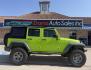 2013 Commando Green /Black Cloth Interior Black Leather Interior Black/ Jeep Wrangler 45733 (1C4BJWFG9DL) with an 3.6L V6 DOHC 24V FFV engine, 5-Speed Automatic6-Speed Manual transmission, located at 2401 E Main St., Grand Prairie, TX, 75050, (972) 262-4440, 32.748981, -96.969643 - Photo#22