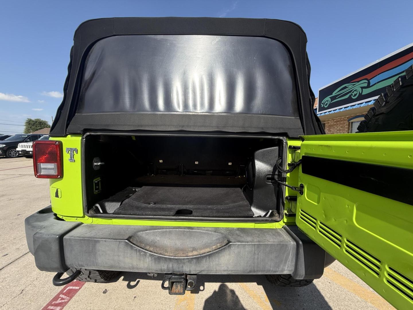 2013 Commando Green /Black Cloth Interior Black Leather Interior Black/ Jeep Wrangler 45733 (1C4BJWFG9DL) with an 3.6L V6 DOHC 24V FFV engine, 5-Speed Automatic6-Speed Manual transmission, located at 2401 E Main St., Grand Prairie, TX, 75050, (972) 262-4440, 32.748981, -96.969643 - Photo#25