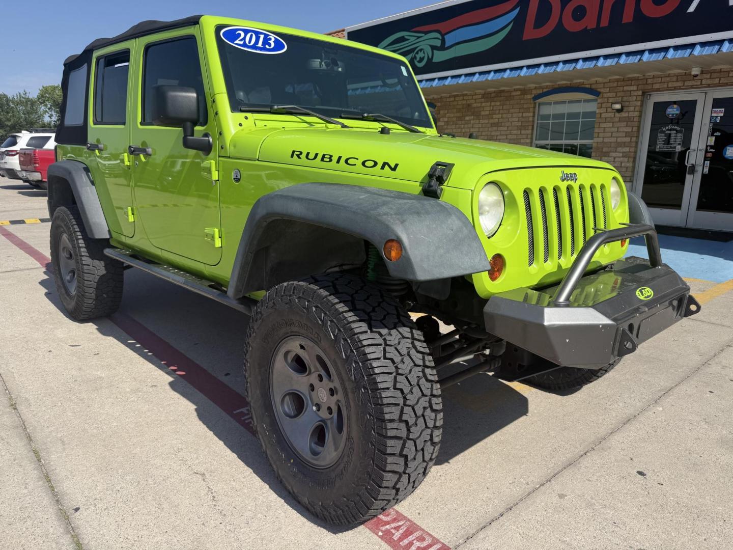 2013 Commando Green /Black Cloth Interior Black Leather Interior Black/ Jeep Wrangler 45733 (1C4BJWFG9DL) with an 3.6L V6 DOHC 24V FFV engine, 5-Speed Automatic6-Speed Manual transmission, located at 2401 E Main St., Grand Prairie, TX, 75050, (972) 262-4440, 32.748981, -96.969643 - Photo#28