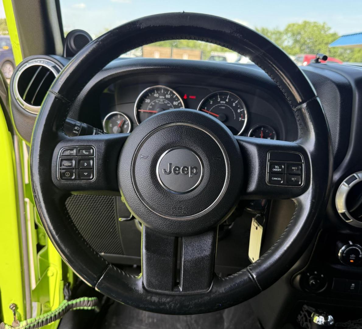 2013 Commando Green /Black Cloth Interior Black Leather Interior Black/ Jeep Wrangler 45733 (1C4BJWFG9DL) with an 3.6L V6 DOHC 24V FFV engine, 5-Speed Automatic6-Speed Manual transmission, located at 2401 E Main St., Grand Prairie, TX, 75050, (972) 262-4440, 32.748981, -96.969643 - Photo#29