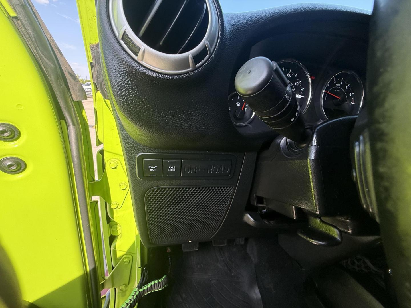 2013 Commando Green /Black Cloth Interior Black Leather Interior Black/ Jeep Wrangler 45733 (1C4BJWFG9DL) with an 3.6L V6 DOHC 24V FFV engine, 5-Speed Automatic6-Speed Manual transmission, located at 2401 E Main St., Grand Prairie, TX, 75050, (972) 262-4440, 32.748981, -96.969643 - Photo#31