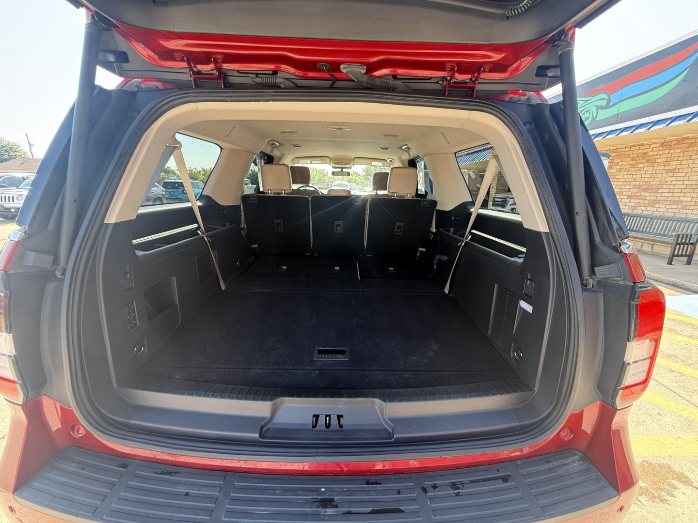2022 Rapid Red Metallic Tinted Clearcoat /Black Onyx Sandstone Ford Expedition 78357 (1FMJK1JT0NE) with an 3.5L V6 DOHC 24V FFV engine, 6-Speed Automatic transmission, located at 2401 E Main St., Grand Prairie, TX, 75050, (972) 262-4440, 32.748981, -96.969643- Photo#11